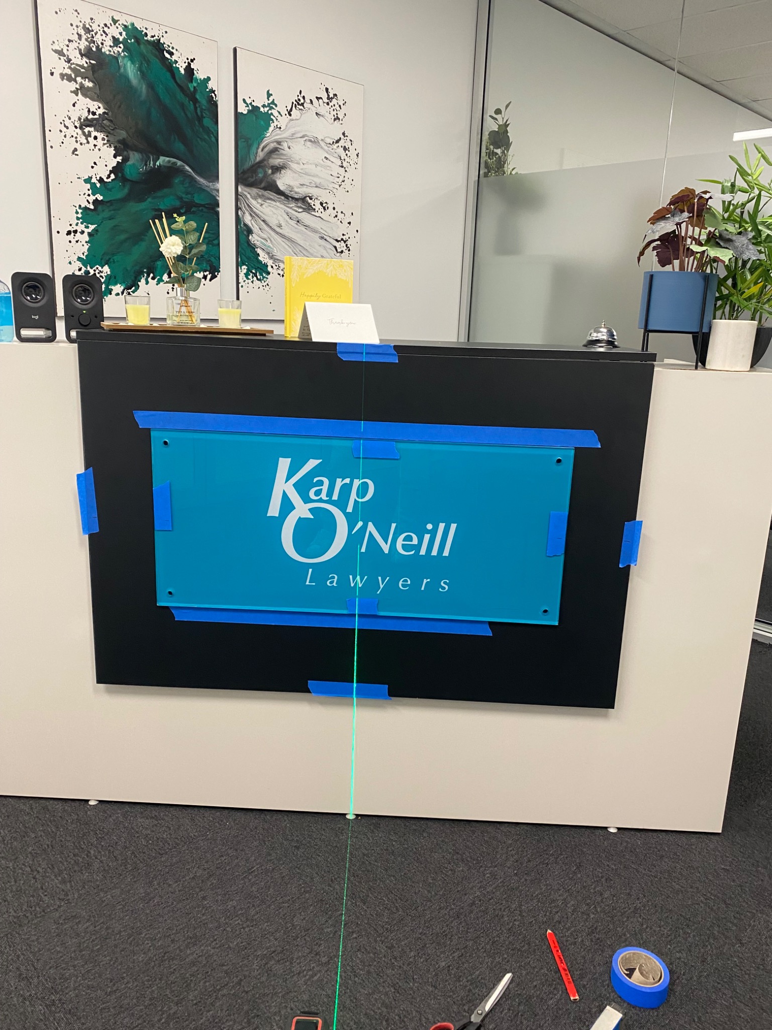 Professional picture hanging installation